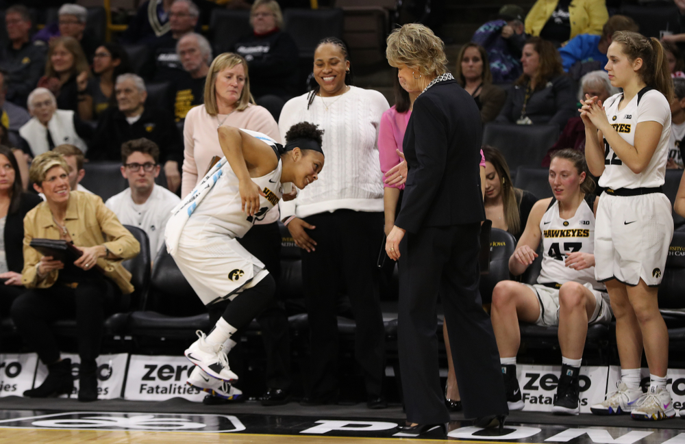 Iowa Hawkeyes guard Tania Davis (11) and head coach Lisa Bluder against the Illinois Fighting Illini Thursday, February 14, 2019 at Carver-Hawkeye Arena. (Brian Ray/hawkeyesports.com)