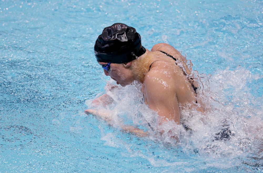 IowaÕs Sage Ohlensehlen swims the breaststroke leg of the 200 Medley Relay against Notre Dame and Illinois Saturday, January 11, 2020 at the Campus Recreation and Wellness Center. (Brian Ray/hawkeyesports.com)