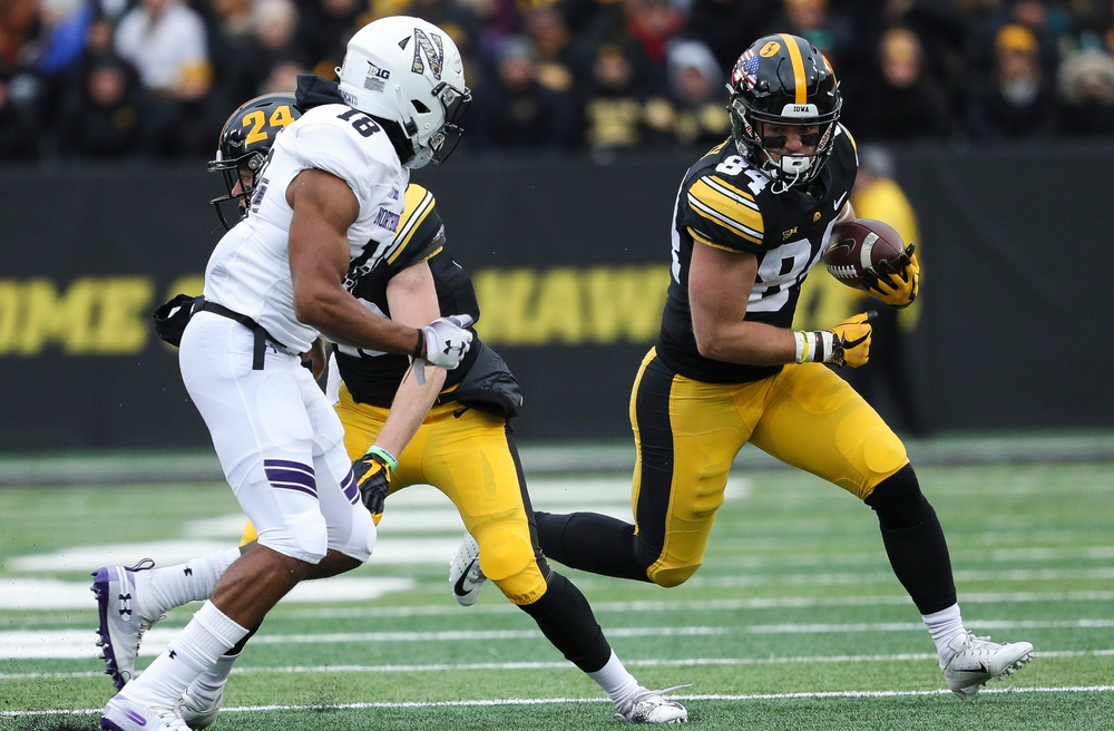 Iowa Hawkeyes wide receiver Nick Easley (84) runs the ball during a game against Northwestern at Kinnick Stadium on November 10, 2018. (Tork Mason/hawkeyesports.com)