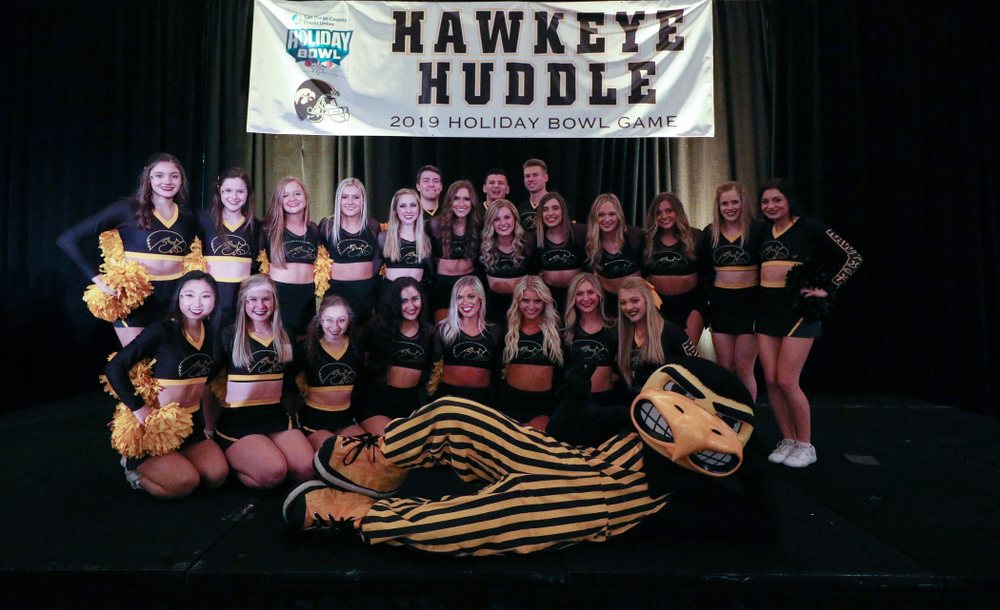 The Hawkeye Marching Band and the Iowa Spirit Squads perform during the Holiday Bowl Hawkeye Huddle Thursday, December 26, 2019 at the Hilton in downtown San Diego. (Brian Ray/hawkeyesports.com)