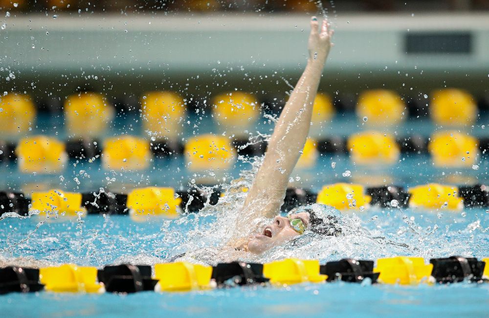 Iowa’s Kennedy Gilbertson swims the backstroke section in the women’s 400 yard medley relay event during their meet at the Campus Recreation and Wellness Center in Iowa City on Friday, February 7, 2020. (Stephen Mally/hawkeyesports.com)