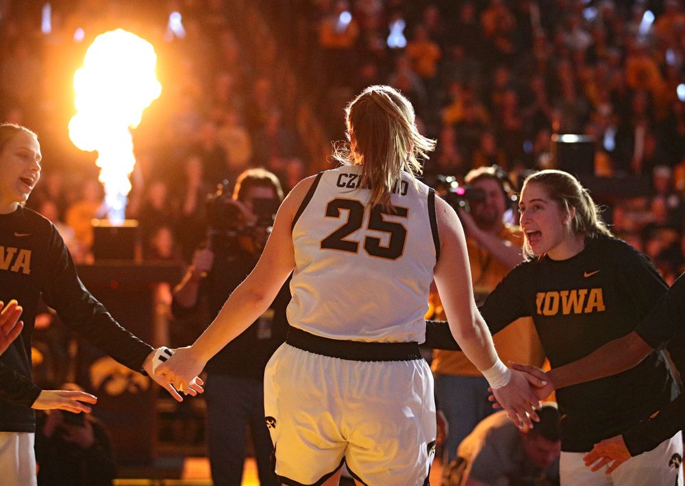 Iowa Hawkeyes forward Monika Czinano (25) is introduced before the game at Carver-Hawkeye Arena in Iowa City on Thursday, February 6, 2020. (Stephen Mally/hawkeyesports.com)
