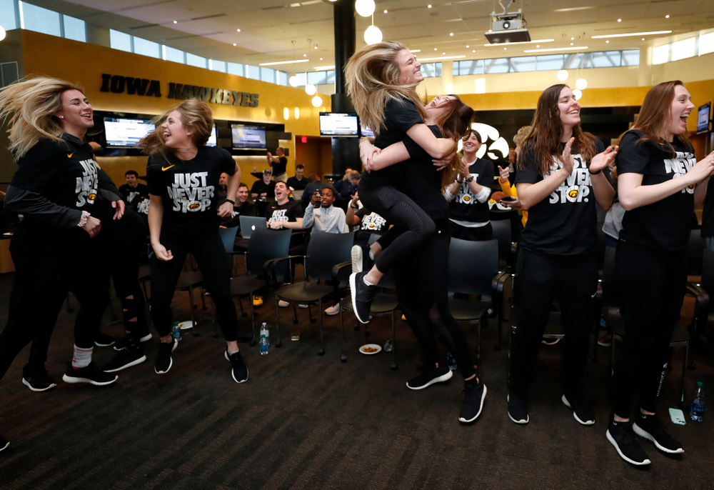 The Iowa Hawkeyes celebrate after finding out their seed in the 2018 NCAA Women's Basketball Tournament