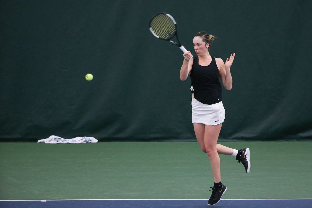 Iowa’s Samantha Mannix returns a hit during the Iowa women’s tennis meet vs DePaul on Friday, February 21, 2020 at the Hawkeye Tennis and Recreation Complex. (Lily Smith/hawkeyesports.com)
