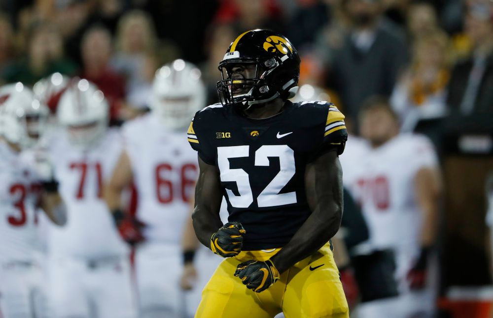 Iowa Hawkeyes linebacker Amani Jones (52) reacts after making a stop against the Wisconsin Badgers Saturday, September 22, 2018 at Kinnick Stadium. (Brian Ray/hawkeyesports.com)