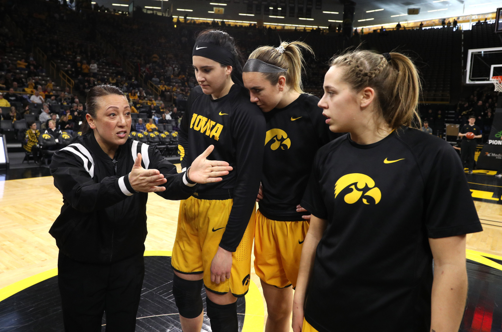 Iowa Hawkeyes forward Megan Gustafson (10), forward Hannah Stewart (21), and guard Kathleen Doyle (22) against the Northwestern Wildcats Sunday, March 3, 2019 at Carver-Hawkeye Arena. (Brian Ray/hawkeyesports.com)