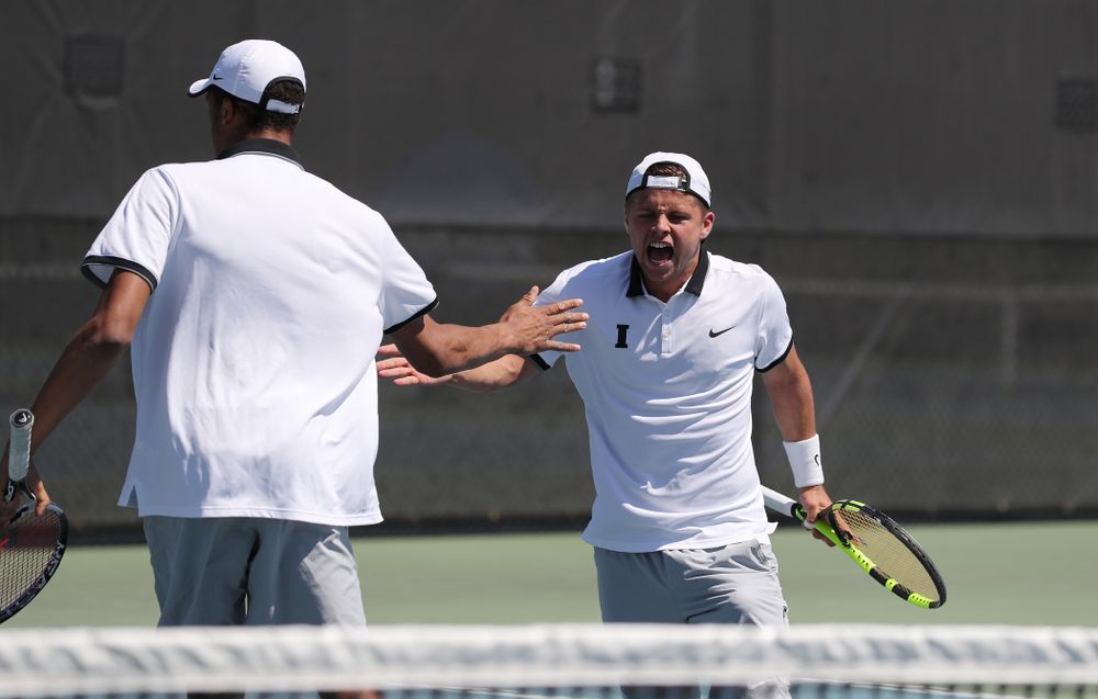 IowaÕs Oliver Okonkwo and Will Davies play a doubles match against the Michigan Wolverines Sunday, April 21, 2019 at the Hawkeye Tennis and Recreation Complex. (Brian Ray/hawkeyesports.com)