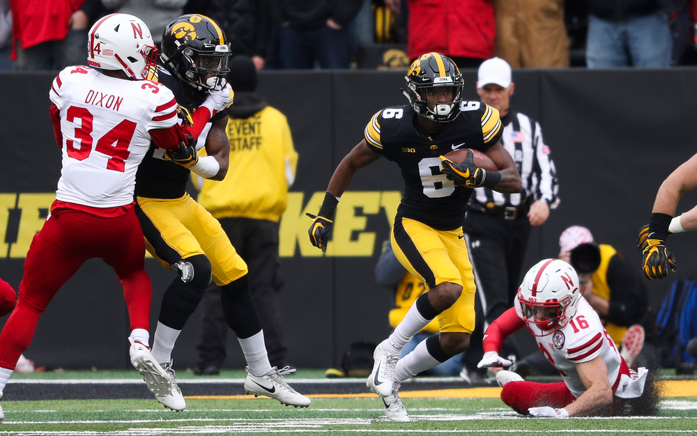 Iowa Hawkeyes wide receiver Ihmir Smith-Marsette (6) returns a kickoff during a game against Nebraska at Kinnick Stadium on November 23, 2018. (Tork Mason/hawkeyesports.com)