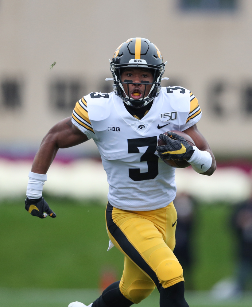 Iowa Hawkeyes wide receiver Tyrone Tracy Jr. (3) carries the ball on his way to a touchdown against the Northwestern Wildcats Saturday, October 26, 2019 at Ryan Field in Evanston, Ill. (Brian Ray/hawkeyesports.com)