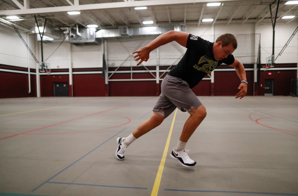 Iowa Hawkeyes quarterback Nathan Stanley (4) works out at his high school Wednesday, May 30, 2018 in Menomonie, Wisc. (Brian Ray/hawkeyesports.com)