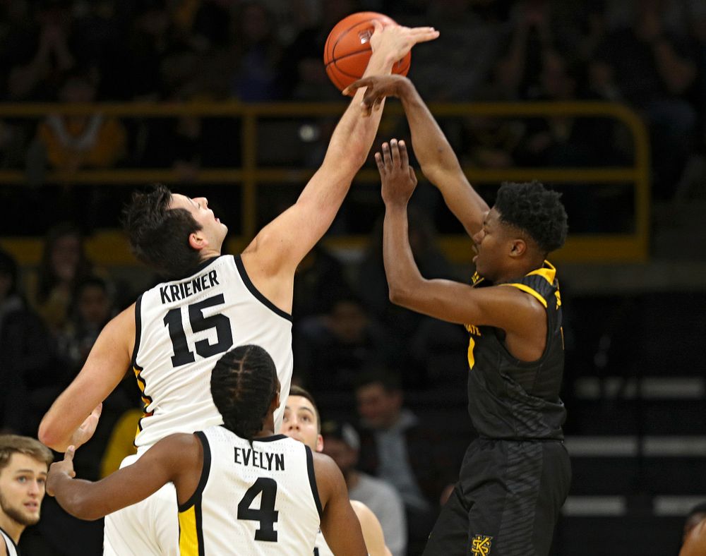 Iowa Hawkeyes forward Ryan Kriener (15) blocks a shot during the second half of their their game at Carver-Hawkeye Arena in Iowa City on Sunday, December 29, 2019. (Stephen Mally/hawkeyesports.com)