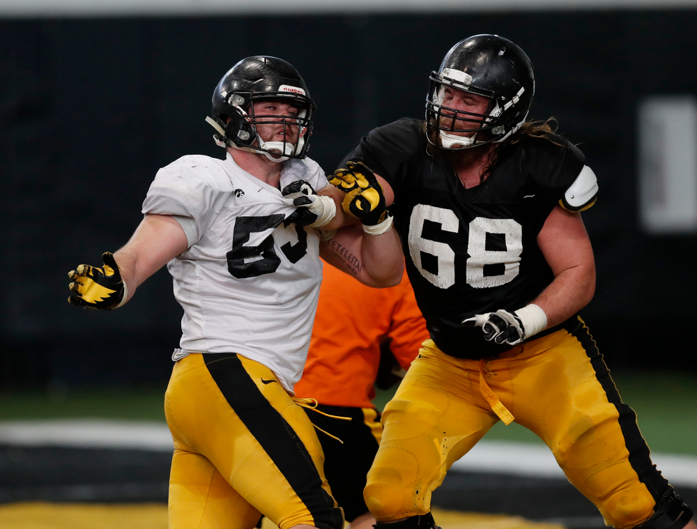 Iowa Hawkeyes defensive lineman Garret Jansen (53) and offensive lineman Landan Paulsen (68) during spring practice Wednesday, March 28, 2018 at the Hansen Football Performance Center. (Brian Ray/hawkeyesports.com)