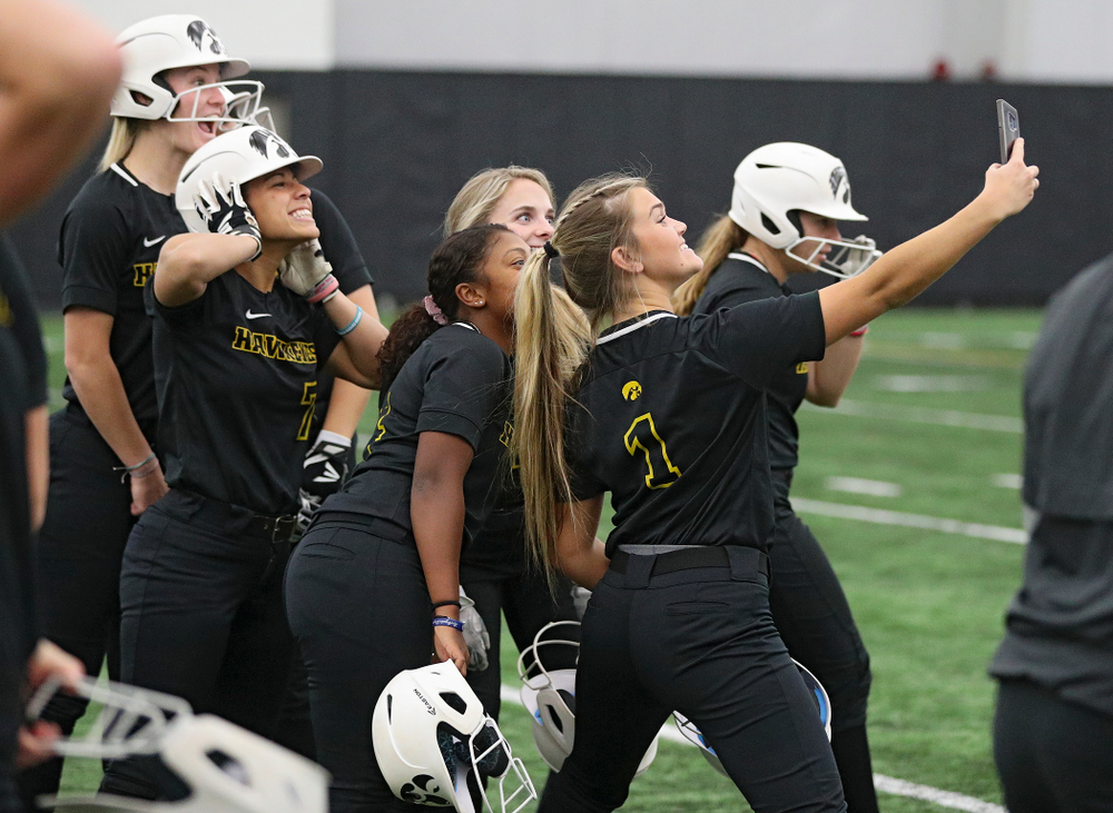 Iowa infielder Cameron Cecil (1) takes a selfie with her teammates during Iowa Softball Media Day at the Hawkeye Tennis and Recreation Complex in Iowa City on Thursday, January 30, 2020. (Stephen Mally/hawkeyesports.com)