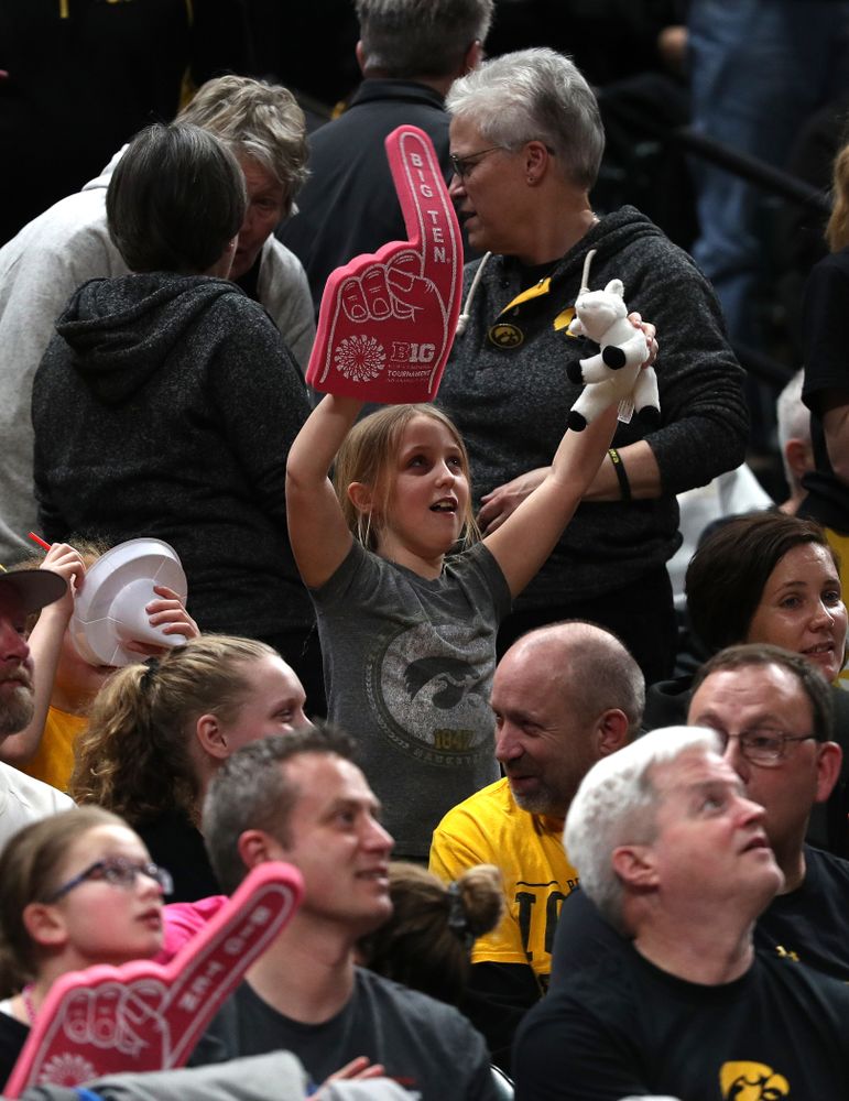 A little girl holds up a stuffed goat as the Iowa Hawkeyes take on the Rutgers Scarlet Knights in the semi-finals of the Big Ten Tournament Saturday, March 9, 2019 at Bankers Life Fieldhouse in Indianapolis, Ind. (Brian Ray/hawkeyesports.com)