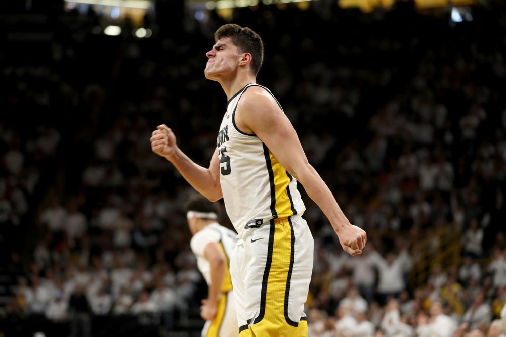 Iowa Hawkeyes forward Luka Garza (55) celebrates after making a basket against the Illinois Fighting Illini Sunday, February 2, 2020 at Carver-Hawkeye Arena. (Brian Ray/hawkeyesports.com)