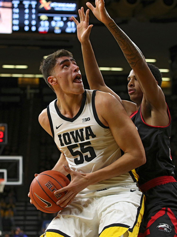 Iowa Hawkeyes center Luka Garza (55) eyes the basket during the first half of their game at Carver-Hawkeye Arena in Iowa City on Friday, Nov 8, 2019. (Stephen Mally/hawkeyesports.com)