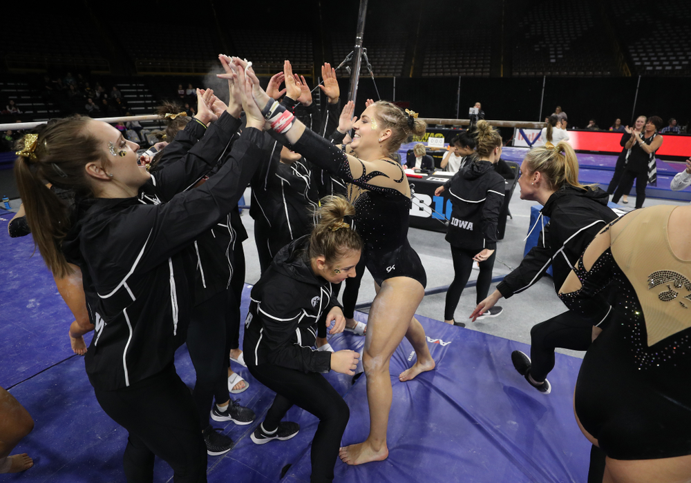 Iowa's Emma Hartzler competes on the bars during their meet against Southeast Missouri State Friday, January 11, 2019 at Carver-Hawkeye Arena. (Brian Ray/hawkeyesports.com)