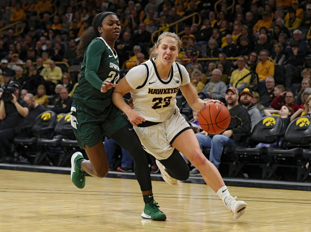 Iowa Hawkeyes guard Kathleen Doyle (22) drives with the ball during the first quarter of their game at Carver-Hawkeye Arena in Iowa City on Sunday, January 26, 2020. (Stephen Mally/hawkeyesports.com)