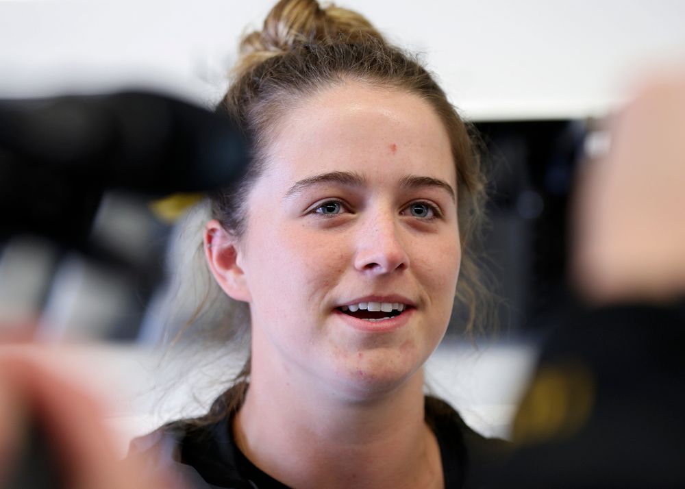 Iowa's Noelle Ossenkop answers a question during media availability at the P. Sue Beckwith, M.D., Boathouse in Iowa City on Wednesday, Apr. 10, 2019. (Stephen Mally/hawkeyesports.com)