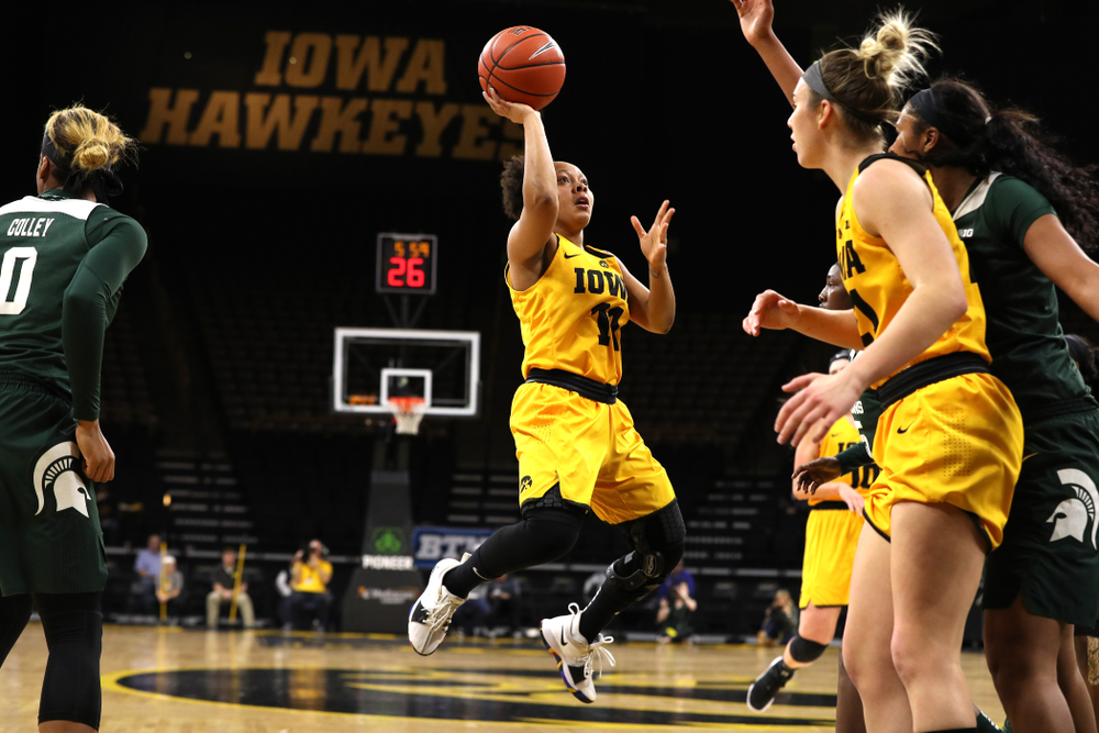 Iowa Hawkeyes guard Tania Davis (11) against the Michigan State Spartans Thursday, February 7, 2019 at Carver-Hawkeye Arena. (Brian Ray/hawkeyesports.com)