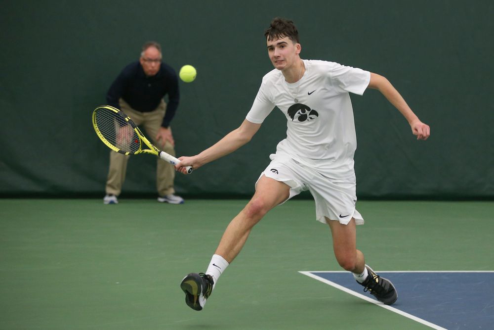 Iowa’s Matt Clegg returns a hit during the Iowa men’s tennis meet vs Nebraska on Sunday, March 1, 2020 at the Hawkeye Tennis and Recreation Complex. (Lily Smith/hawkeyesports.com)