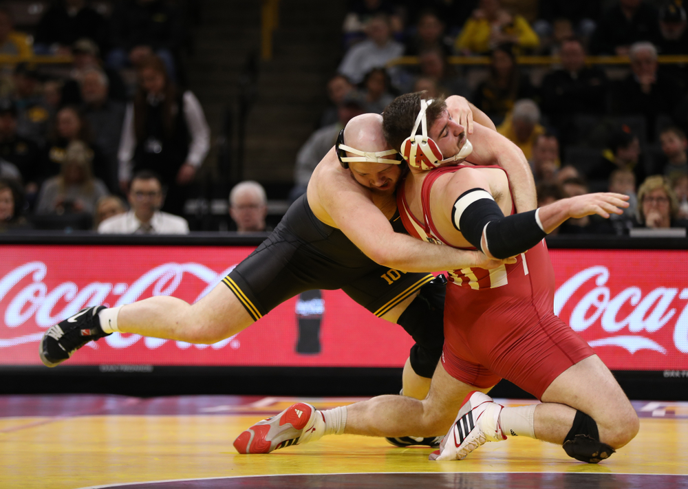 Iowa's Sam Stoll wrestles Indiana's Fletcher Miller at heavyweight Friday, February 15, 2019 at Carver-Hawkeye Arena. (Brian Ray/hawkeyesports.com)