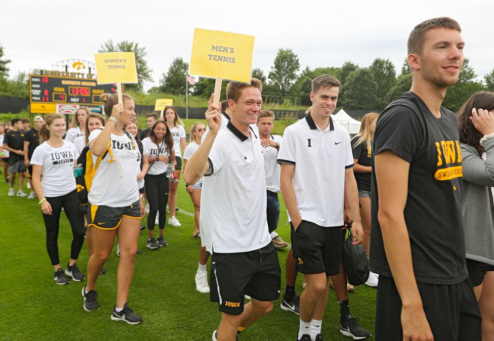 Student-athletes walk in the Parade of Champions during the Student-Athlete Kickoff at the Iowa Soccer Complex in Iowa City on Sunday, Aug 25, 2019. (Stephen Mally/hawkeyesports.com)