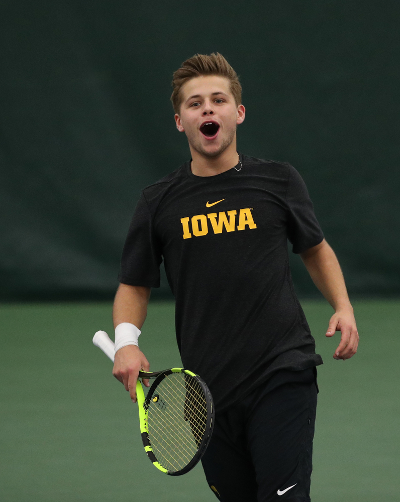 Will Davies and Oliver Okonkwo plays a doubles match against the Miami Hurricanes Friday, February 8, 2019 at the Hawkeye Tennis and Recreation Complex. (Brian Ray/hawkeyesports.com)