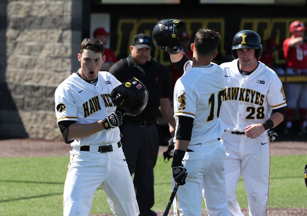 Iowa Hawkeyes outfielder Ben Norman (9) celebrates a home run against the Nebraska Cornhuskers Saturday, April 20, 2019 at Duane Banks Field. (Brian Ray/hawkeyesports.com)