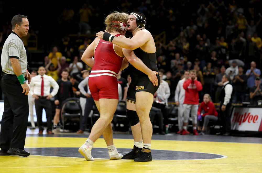 IowaÕs Tony Cassioppi wrestles WisconsinÕs Trent Hillger at heavyweight Sunday, December 1, 2019 at Carver-Hawkeye Arena. Cassioppi won the match 3-2. (Brian Ray/hawkeyesports.com)