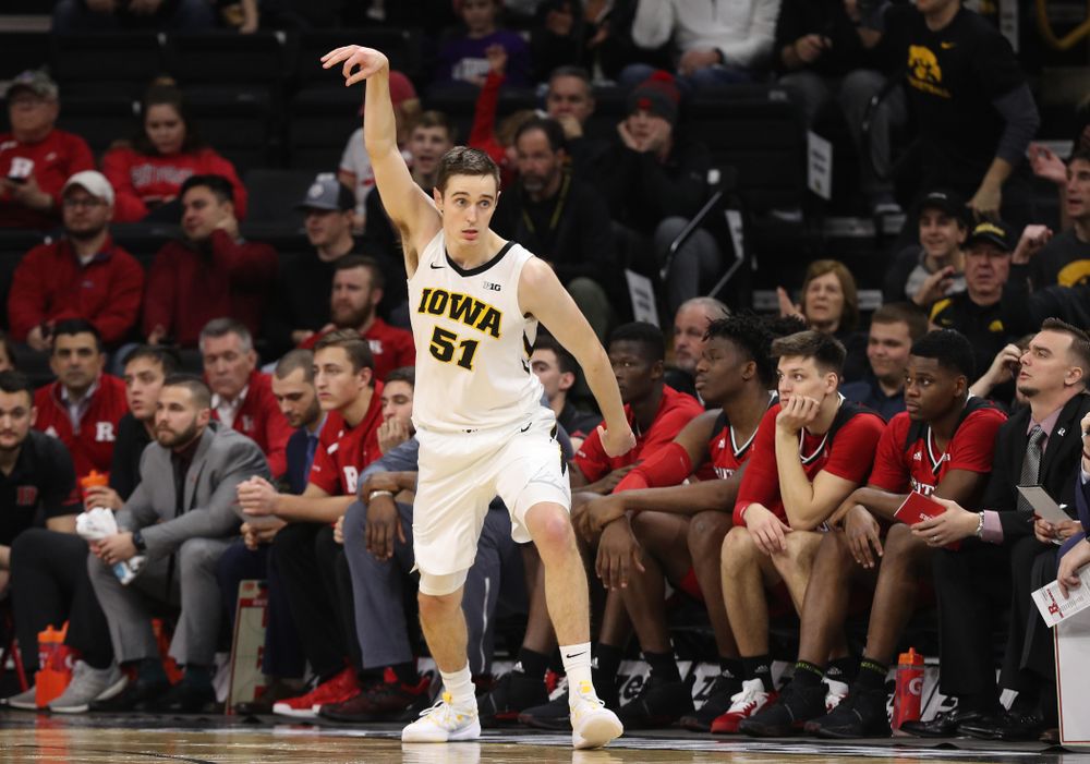 Iowa Hawkeyes forward Nicholas Baer (51) knocks down a three point basket against the Rutgers Scarlet Knights Saturday, March 2, 2019 at Carver-Hawkeye Arena. (Brian Ray/hawkeyesports.com)