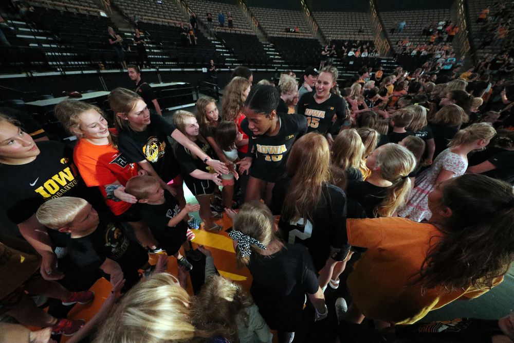 Iowa Hawkeyes outside hitter Griere Hughes (10) and defensive specialist Maddie Slagle (15) against the Iowa State Cyclones Saturday, September 21, 2019 at Carver-Hawkeye Arena. (Brian Ray/hawkeyesports.com)