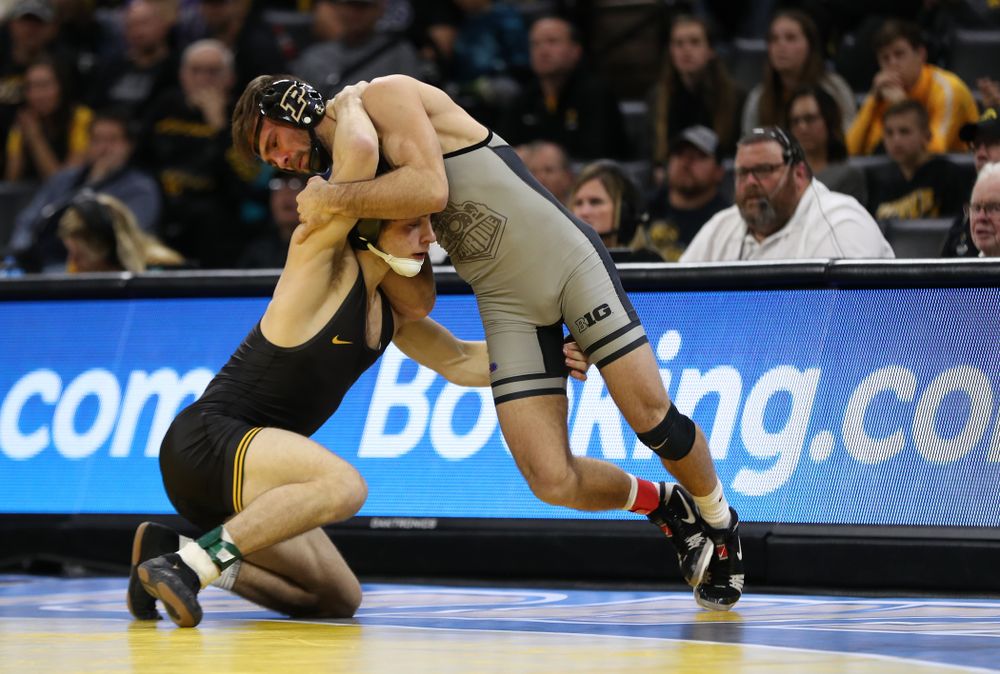 Iowa's Austin DeSanto wrestles Purdue's Ben Thornton at 133 pounds Saturday, November 24, 2018 at Carver-Hawkeye Arena. (Brian Ray/hawkeyesports.com)