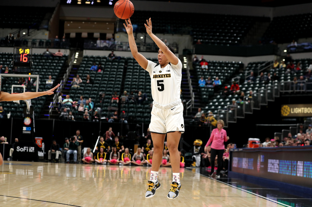 Iowa Hawkeyes guard Alexis Sevillian (5) against the Rutgers Scarlet Knights in the semi-finals of the Big Ten Tournament Saturday, March 9, 2019 at Bankers Life Fieldhouse in Indianapolis, Ind. (Brian Ray/hawkeyesports.com)