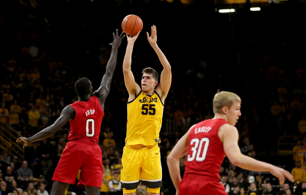Iowa Hawkeyes forward Luka Garza (55) knocks down a three point basket against the Nebraska Cornhuskers Saturday, February 8, 2020 at Carver-Hawkeye Arena. (Brian Ray/hawkeyesports.com)