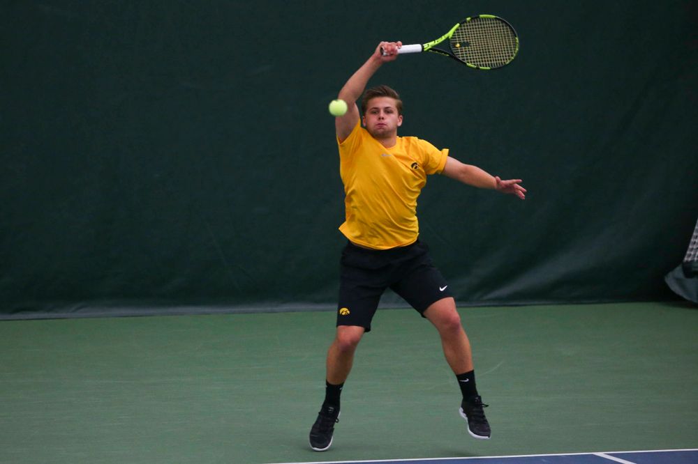 Iowa's Will Davies at a tennis match vs Drake Friday, March 8, 2019 at the Hawkeye Tennis and Recreation Complex. (Lily Smith/hawkeyesports.com)