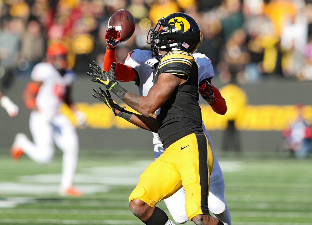 Iowa Hawkeyes wide receiver Ihmir Smith-Marsette (6) pulls in a pass during the third quarter of their game at Kinnick Stadium in Iowa City on Saturday, Nov 23, 2019. (Stephen Mally/hawkeyesports.com)