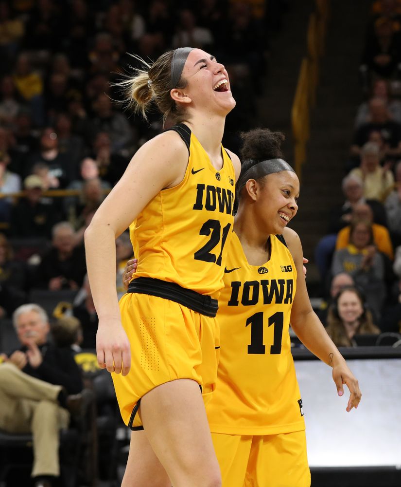 Iowa Hawkeyes forward Hannah Stewart (21) and guard Tania Davis (11) during senior day ceremonies following their game against the Northwestern Wildcats Sunday, March 3, 2019 at Carver-Hawkeye Arena. (Brian Ray/hawkeyesports.com)
