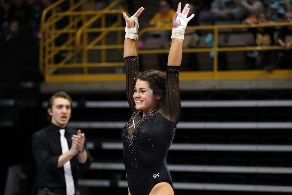 Iowa's Erin Castle competes on the vault against Illinois Saturday, February 16, 2019 at Carver-Hawkeye Arena. (Brian Ray/hawkeyesports.com)
