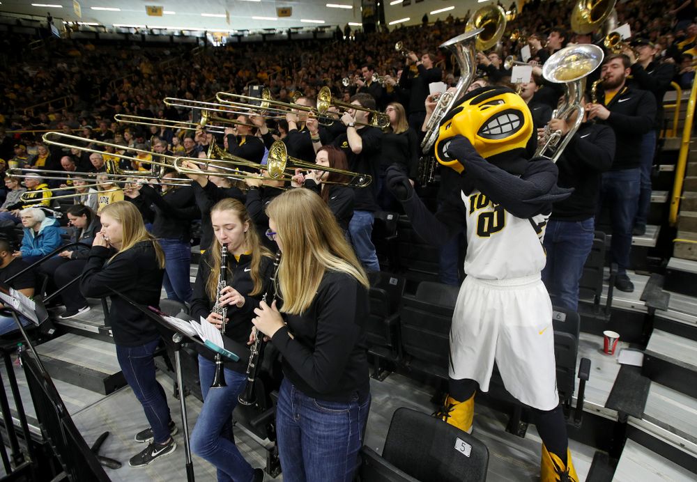 Herky plays with the band during halftime of their second round game in the 2019 NCAA Women's Basketball Tournament at Carver Hawkeye Arena in Iowa City on Sunday, Mar. 24, 2019. (Stephen Mally for hawkeyesports.com)