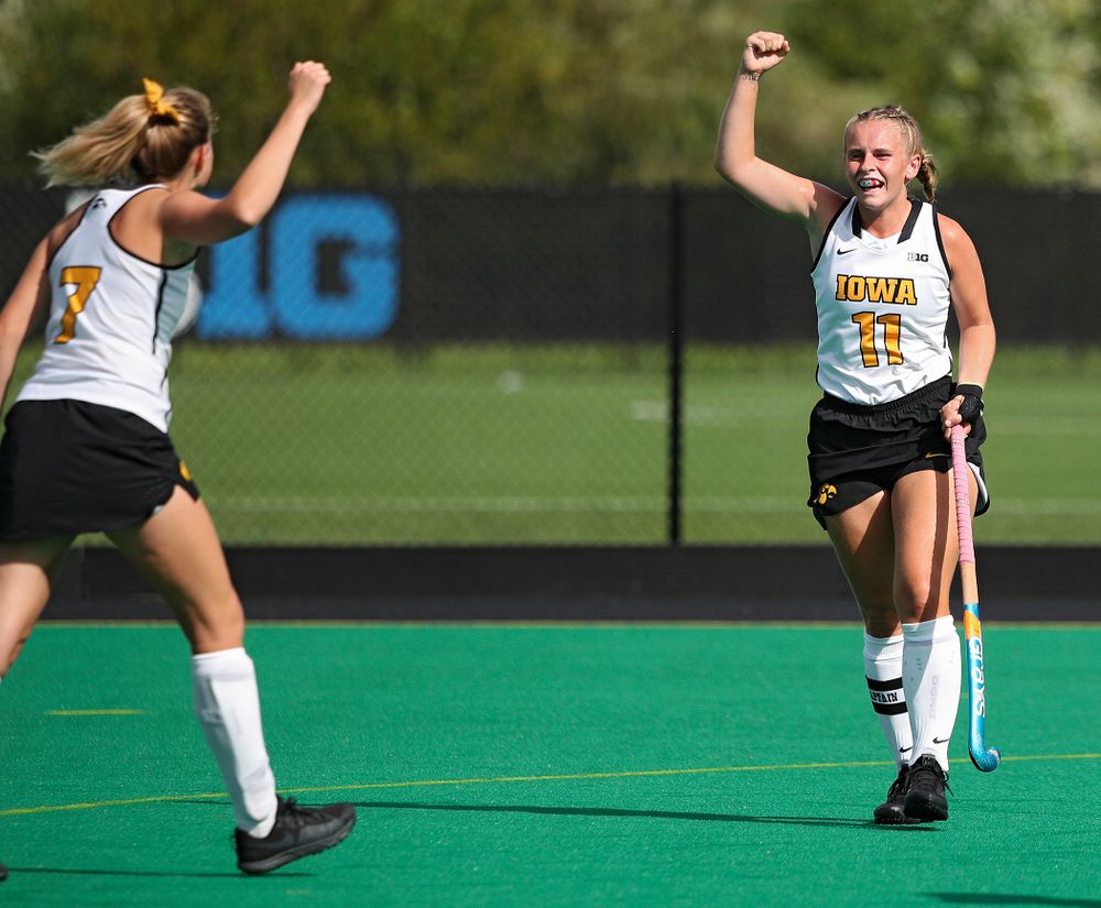 Iowa’s Ellie Holley (7) and Katie Birch (11) celebrate after Birch scored a goal during the second quarter of their game at Grant Field in Iowa City on Friday, Sep 13, 2019. (Stephen Mally/hawkeyesports.com)