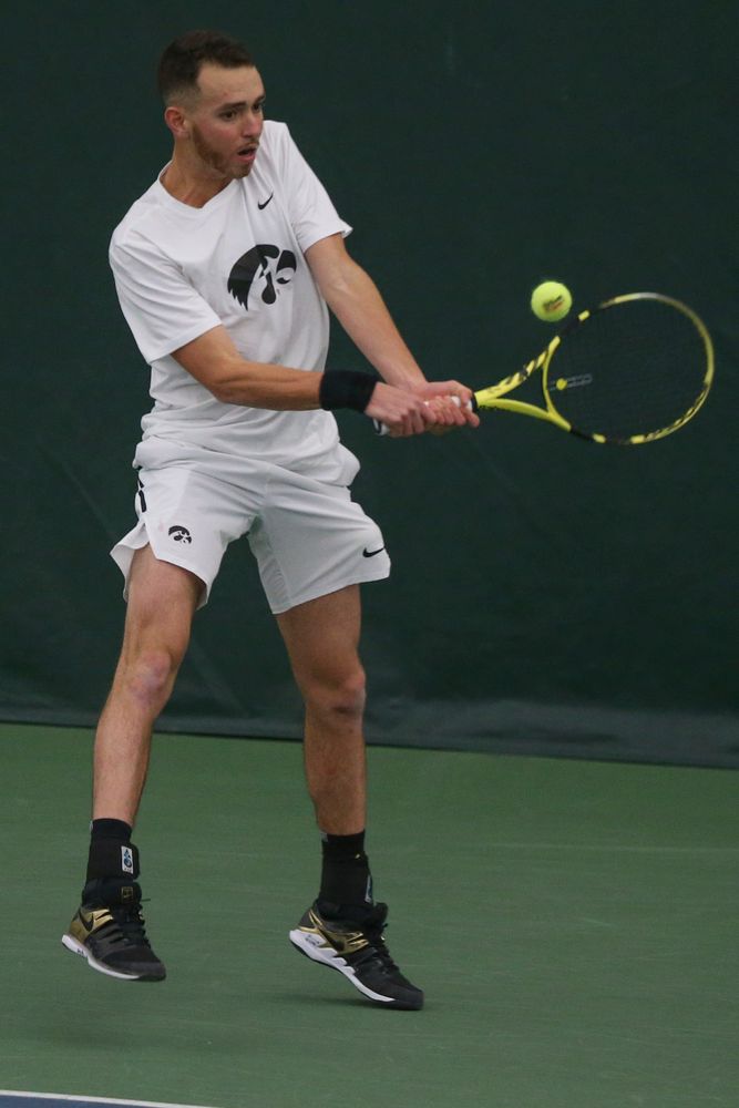 Iowa’s Kareem Allaf returns a hit during the Iowa men’s tennis meet vs Nebraska on Sunday, March 1, 2020 at the Hawkeye Tennis and Recreation Complex. (Lily Smith/hawkeyesports.com)