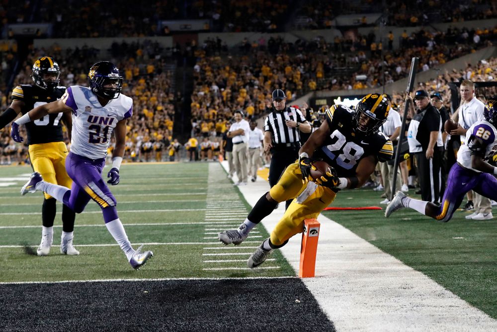 Iowa Hawkeyes running back Toren Young (28) scores a touchdown against the Northern Iowa Panthers Saturday, September 15, 2018 at Kinnick Stadium. (Brian Ray/hawkeyesports.com)