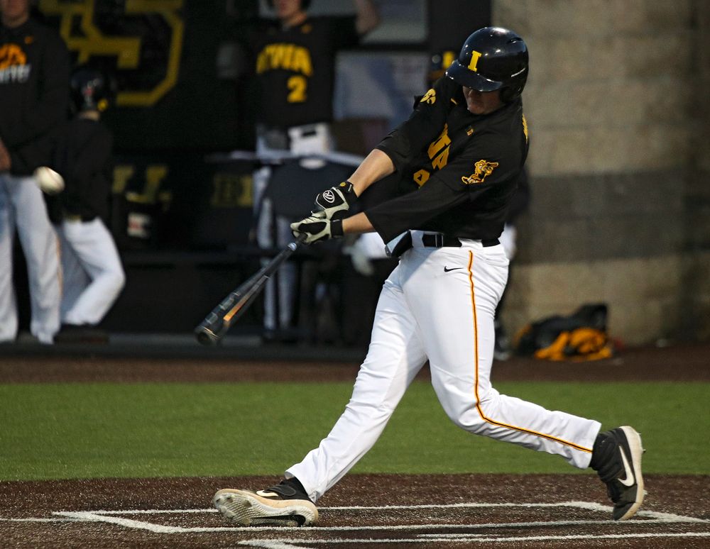 Iowa first baseman Peyton Williams (45) hits a triple during the sixth inning of their game at Duane Banks Field in Iowa City on Tuesday, March 3, 2020. (Stephen Mally/hawkeyesports.com)