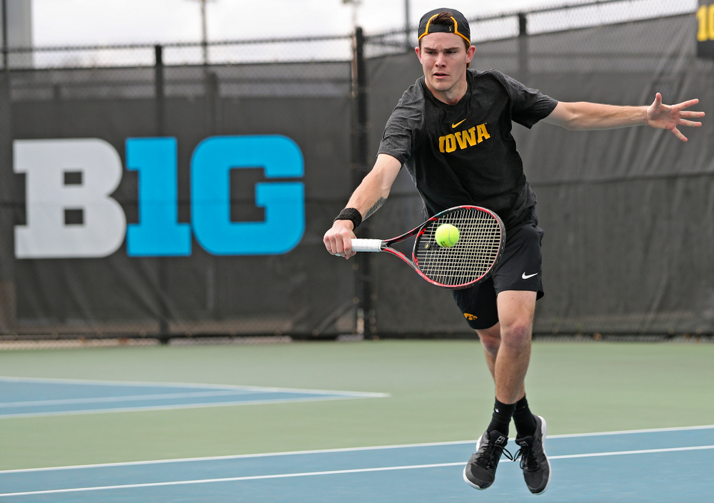 Iowa's Jonas Larsen competes during a double match against Ohio State at the Hawkeye Tennis and Recreation Complex in Iowa City on Sunday, Apr. 7, 2019. (Stephen Mally/hawkeyesports.com)