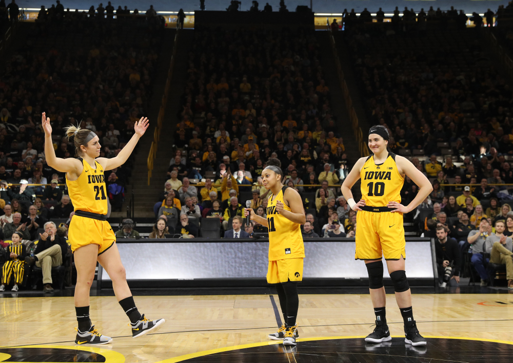 Iowa Hawkeyes forward Megan Gustafson (10), guard Tania Davis (11), and forward Hannah Stewart (21) during senior day ceremonies following their game against the Northwestern Wildcats Sunday, March 3, 2019 at Carver-Hawkeye Arena. (Brian Ray/hawkeyesports.com)