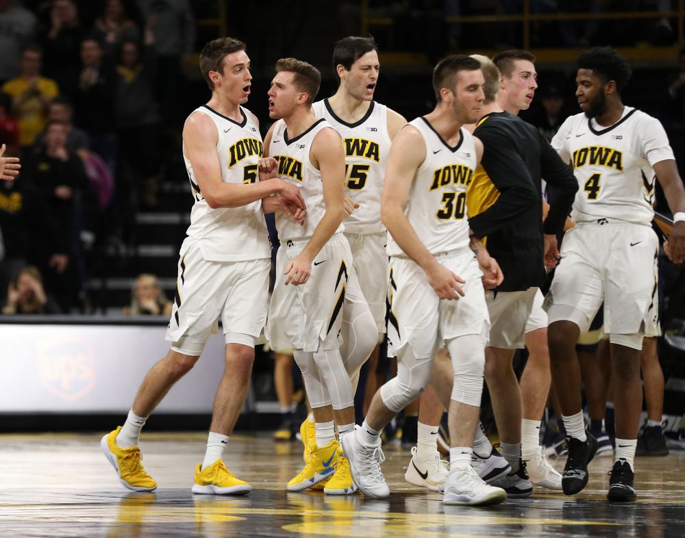 Iowa Hawkeyes forward Nicholas Baer (51) and guard Jordan Bohannon (3) against the Pitt Panthers Tuesday, November 27, 2018 at Carver-Hawkeye Arena. (Brian Ray/hawkeyesports.com)