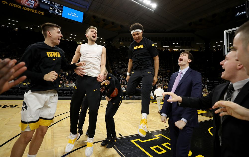 Iowa Hawkeyes guard Austin Ash (13), forward Riley Till (20), and forward Cordell Pemsl (35) against the Michigan Wolverines Friday, January 17, 2020 at Carver-Hawkeye Arena. (Brian Ray/hawkeyesports.com)
