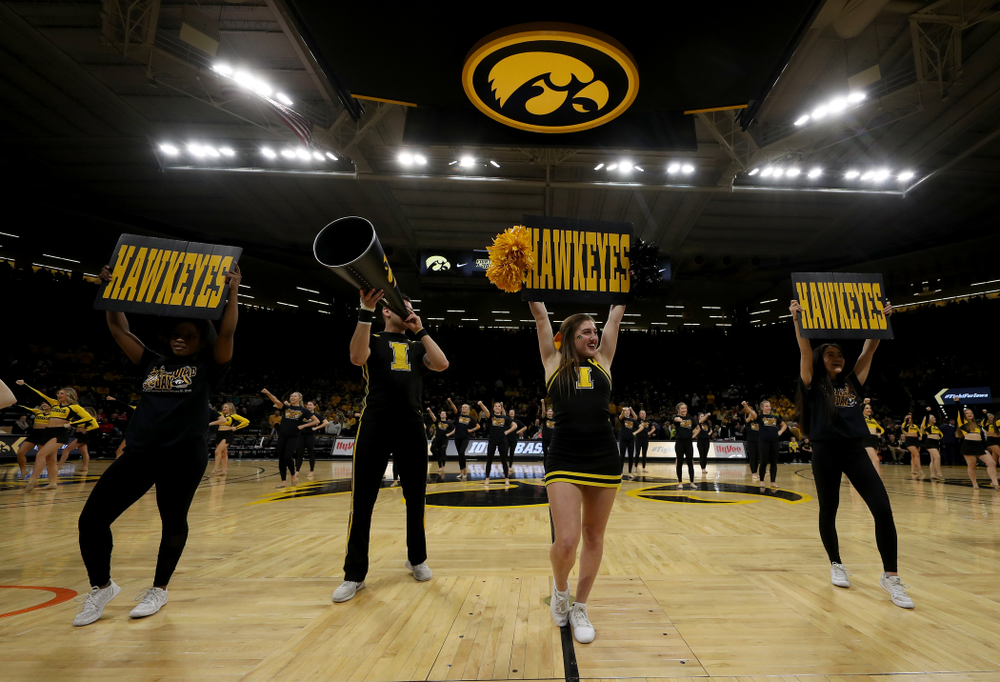 The Iowa Spirit Squad performs with participants in Spirit Squad Day at halftime of the Iowa Hawkeyes game against the Nebraska Cornhuskers Saturday, February 8, 2020 at Carver-Hawkeye Arena. (Brian Ray/hawkeyesports.com)