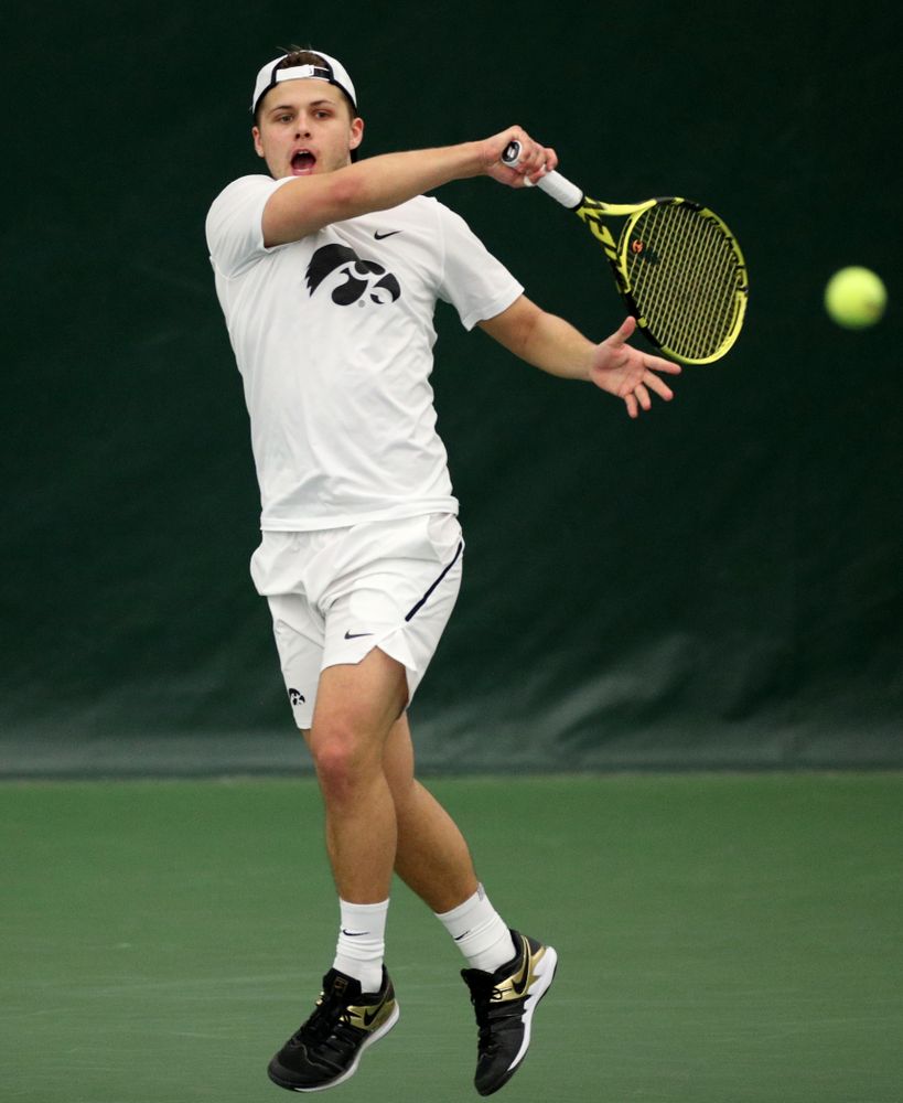 Iowa’s Will Davies against Cornell Sunday, March 8, 2020 at the Hawkeye Tennis and Recreation Center. (Brian Ray/hawkeyesports.com)